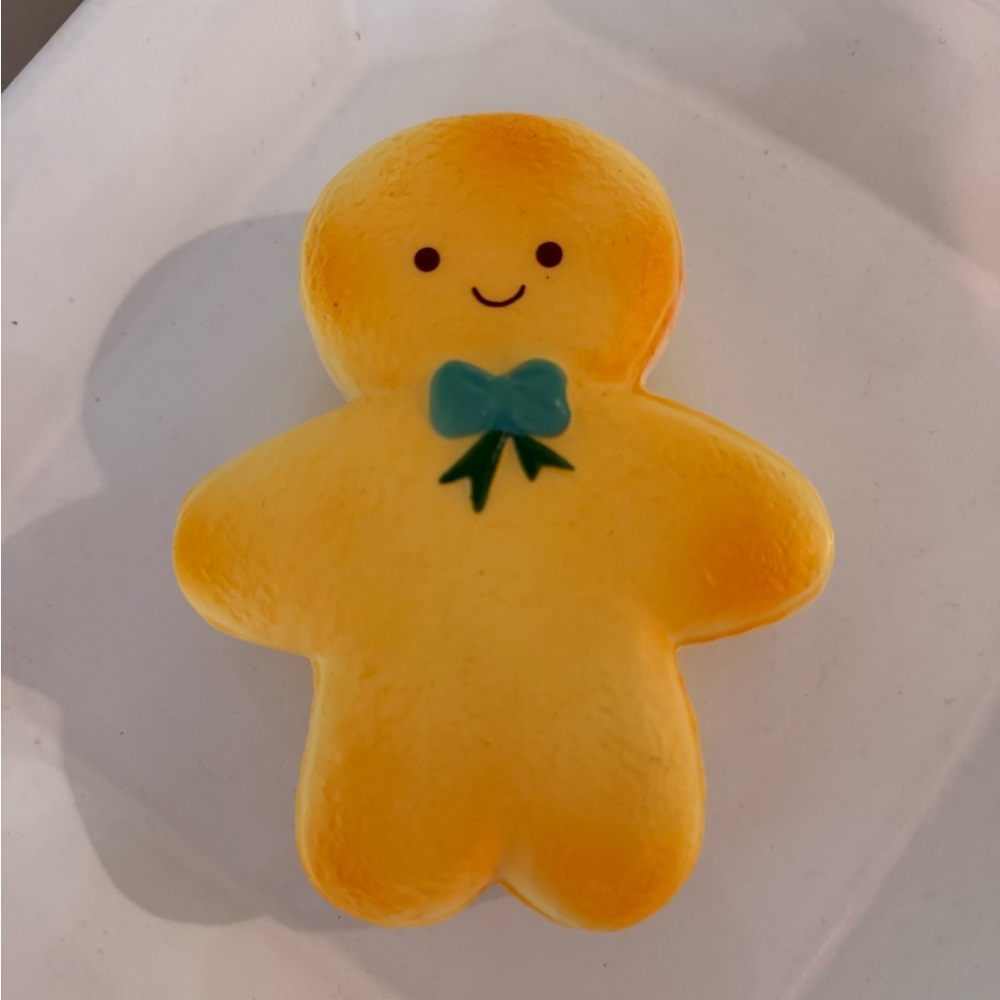 Yellow Gingerbread Squishy Toy with Blue green Bow -